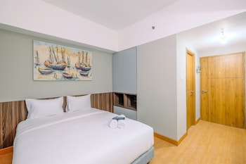 comfortable pool view studio room at gateway park lrt city bekasi apartment