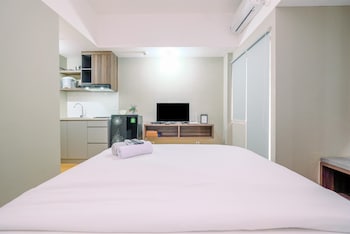 comfortable pool view studio room at gateway park lrt city bekasi apartment