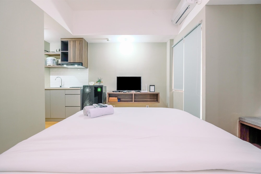 comfortable pool view studio room at gateway park lrt city bekasi apartment