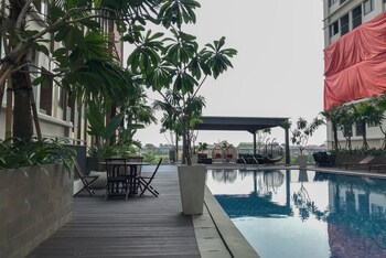 comfortable pool view studio room at gateway park lrt city bekasi apartment