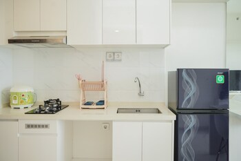 fully furnished with cozy design 2br at sky house bsd apartment