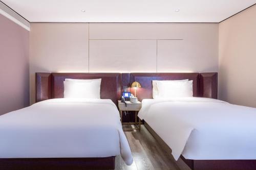 plus yishang hotel wanlvyuan store of haikou international trade