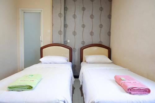 reddoorz jalan emmy saelan palu