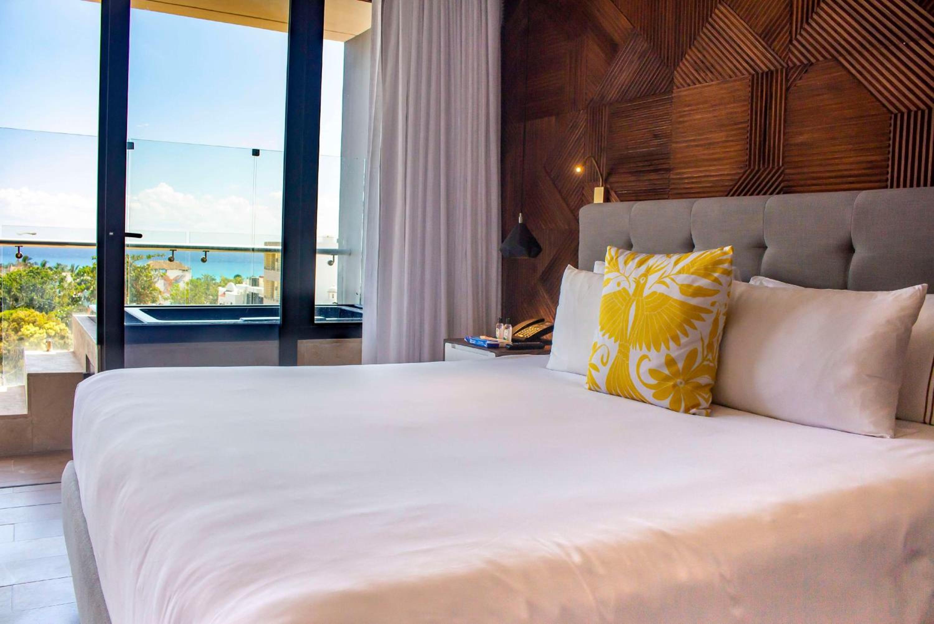 the fives downtown hotel curio by hilton