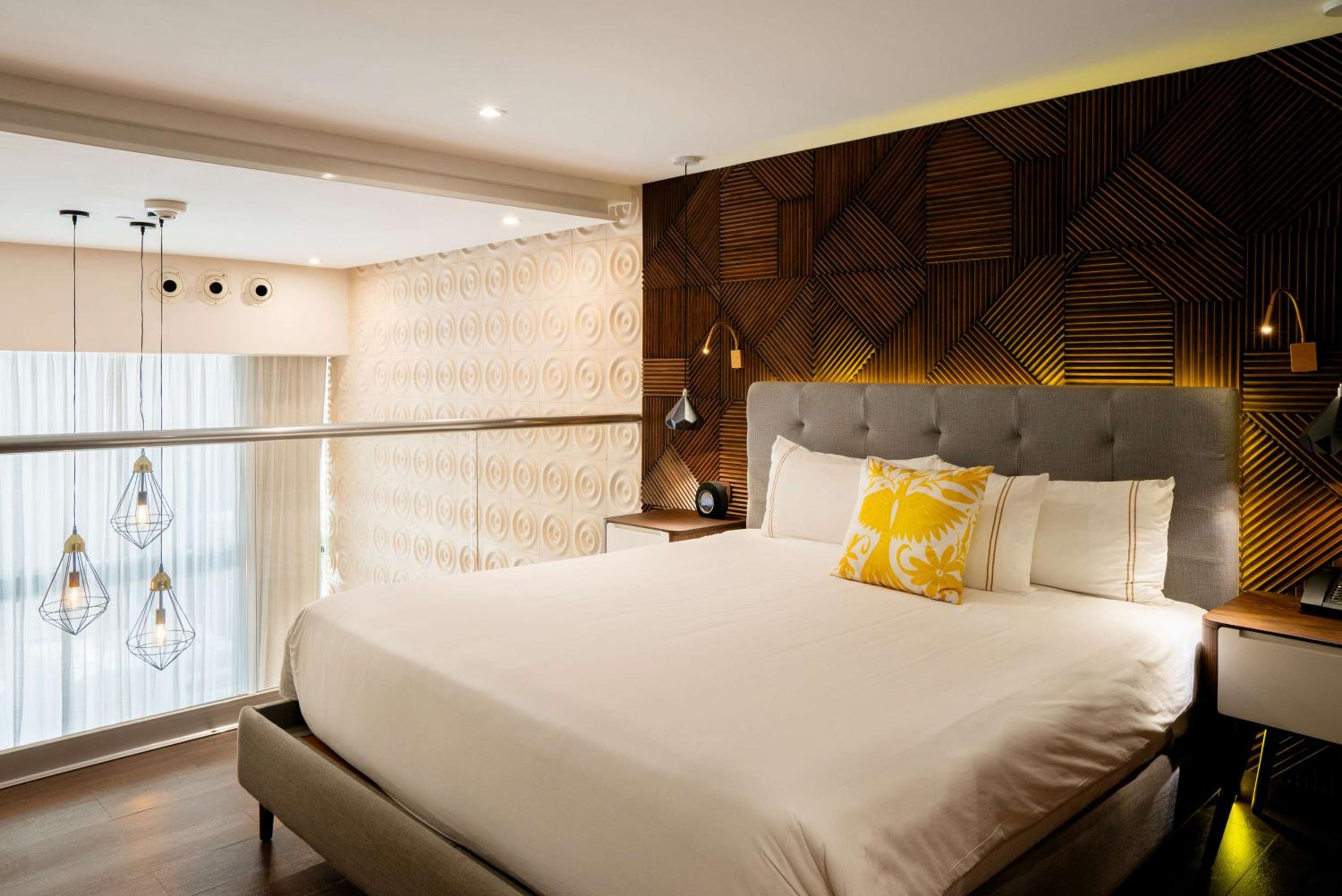 the fives downtown hotel curio by hilton