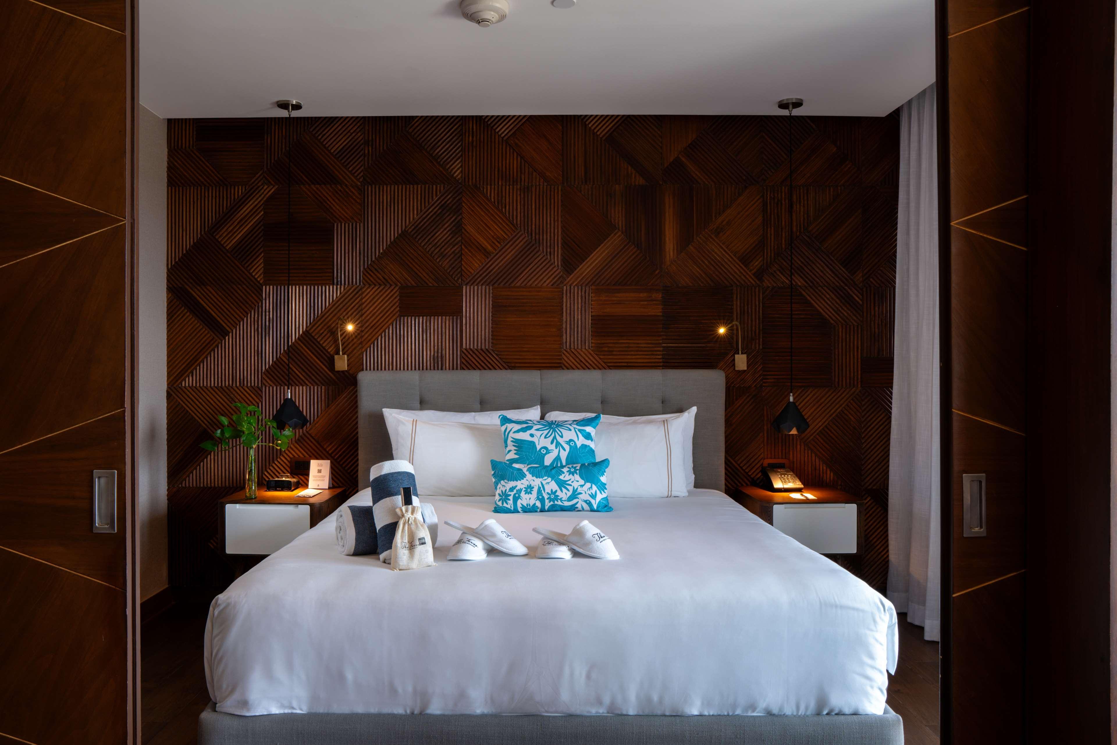 the fives downtown hotel curio by hilton
