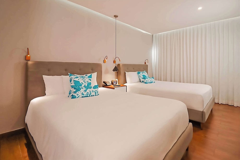the fives downtown hotel curio by hilton