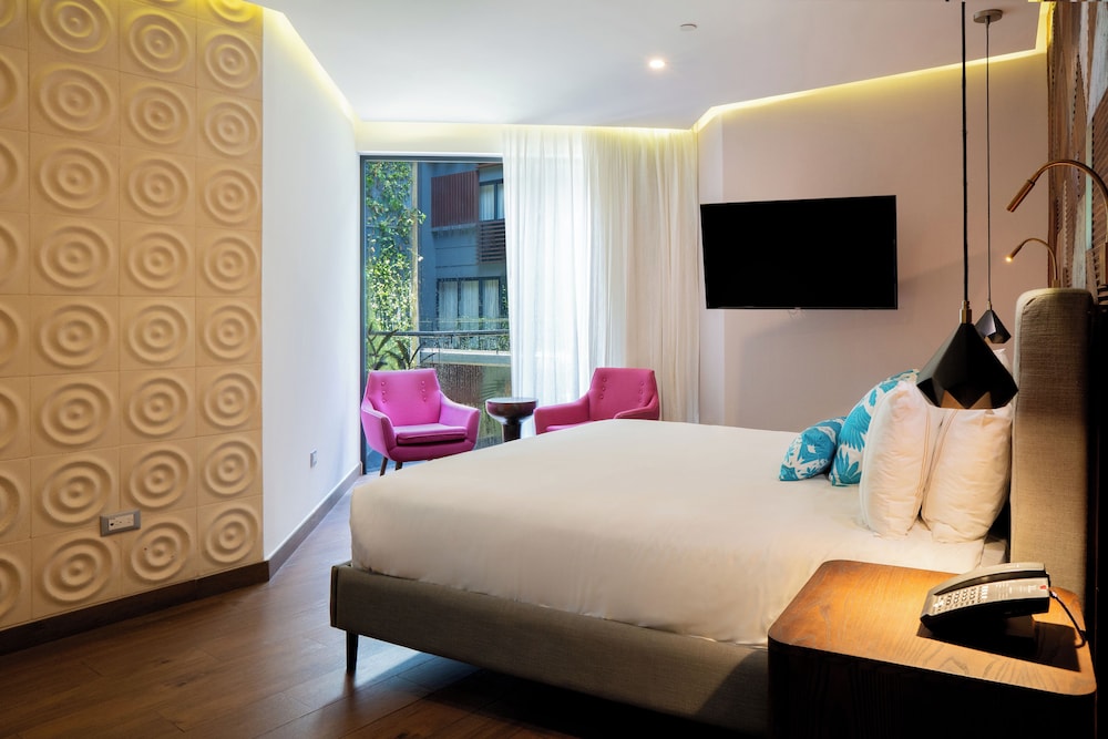 the fives downtown hotel curio by hilton