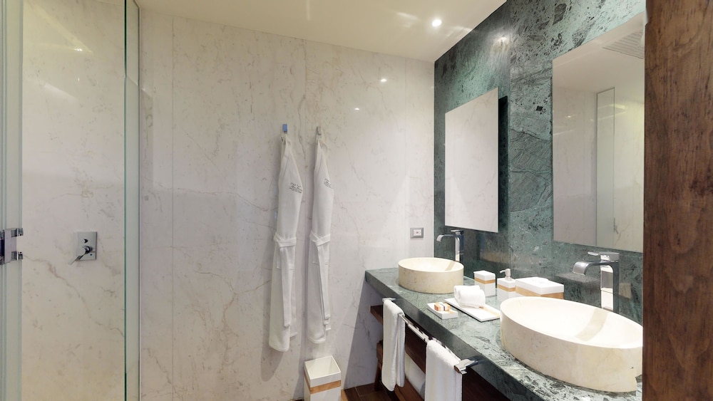 the fives downtown hotel curio by hilton