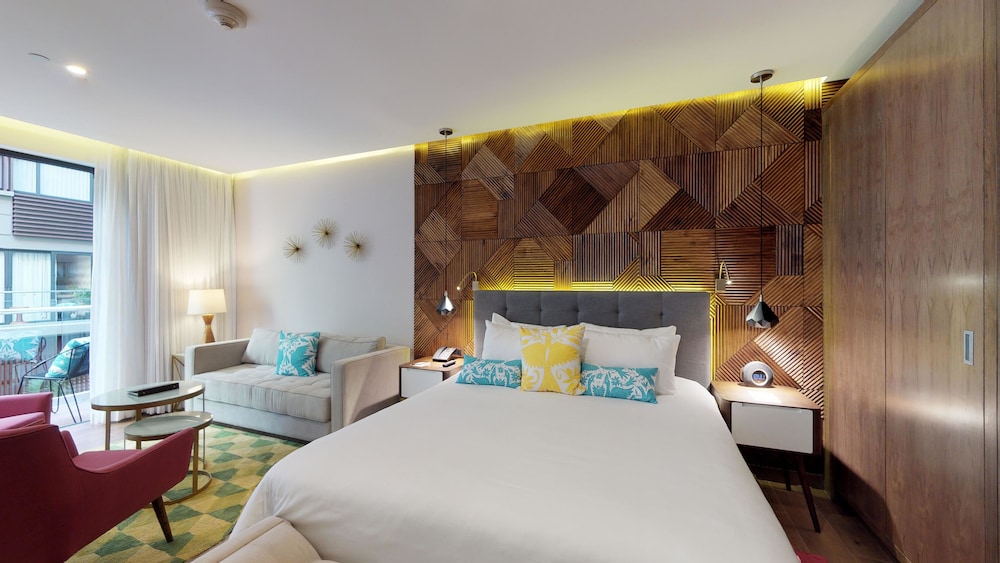 the fives downtown hotel curio by hilton