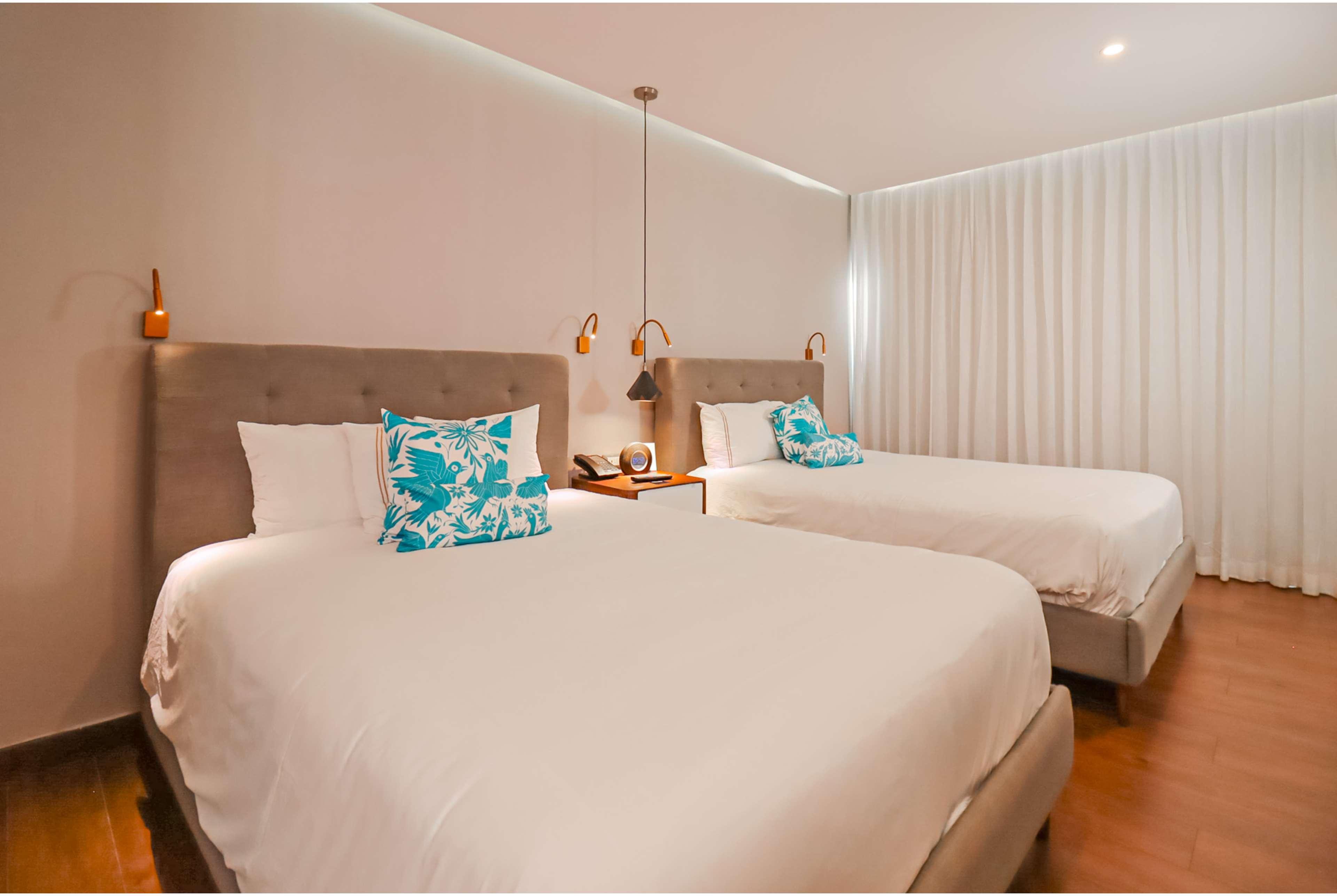 the fives downtown hotel curio by hilton