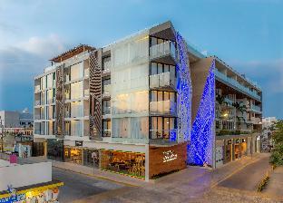 the fives downtown hotel curio by hilton