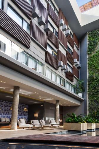 the fives downtown hotel curio by hilton