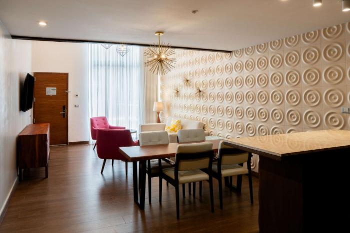 the fives downtown hotel curio by hilton