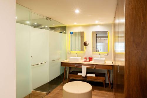 the fives downtown hotel curio by hilton