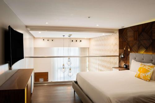 the fives downtown hotel curio by hilton