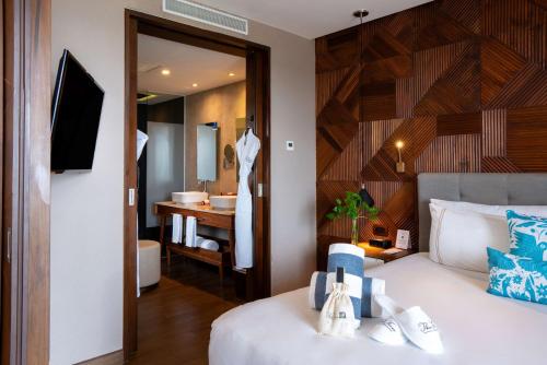 the fives downtown hotel curio by hilton