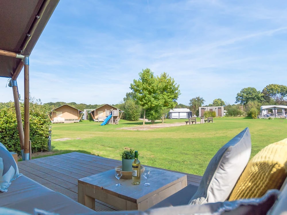 comfortably furnished tent lodge with stove near the veluwe