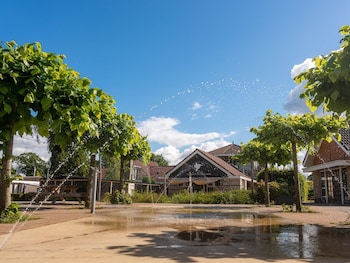 attractive bungalow with a covered terrace near the veluwe