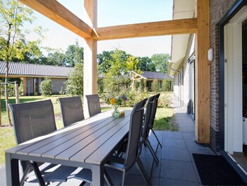 attractive bungalow with a covered terrace near the veluwe