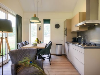 attractive bungalow with a covered terrace near the veluwe