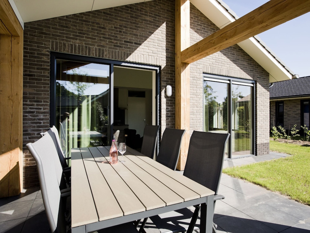 attractive bungalow with a covered terrace near the veluwe