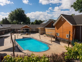attractive bungalow with a covered terrace near the veluwe