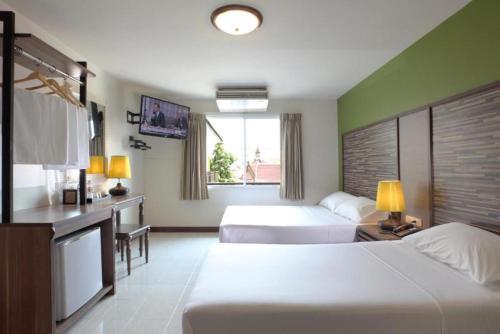 rambuttri village inn and plaza