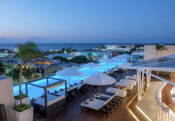 the fives downtown hotel curio collection by hilton