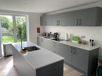 family friendly 2 bed garden apartment with terrace private parking