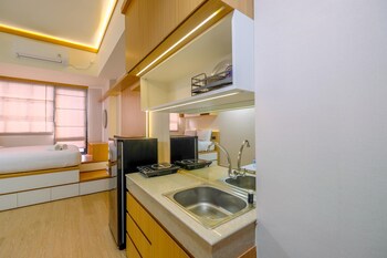 best deal and tidy studio at evenciio margonda apartment