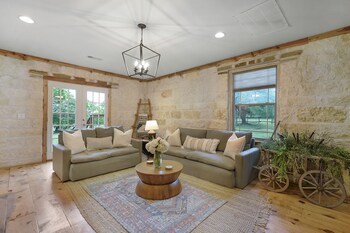 new luxury home with fire pit and hill country views