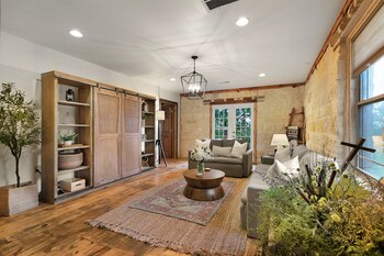 new luxury home with fire pit and hill country views