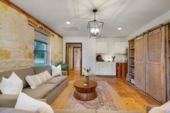 new luxury home with fire pit and hill country views