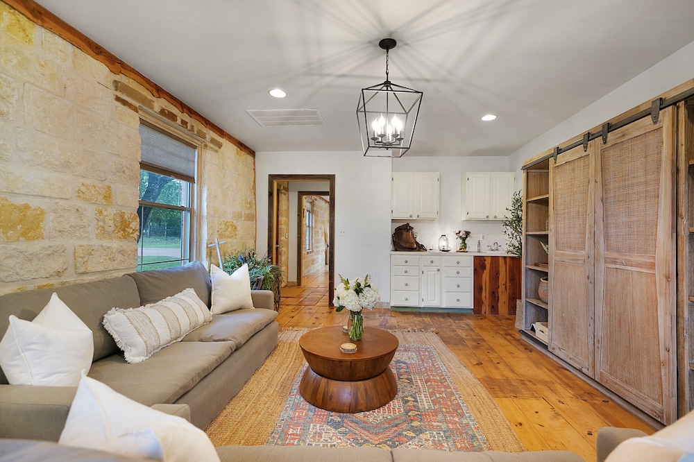 new luxury home with fire pit and hill country views