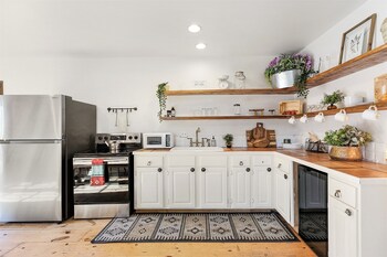 new luxury home with fire pit and hill country views