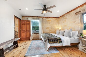 new luxury home with fire pit and hill country views