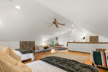 new luxury home with fire pit and hill country views