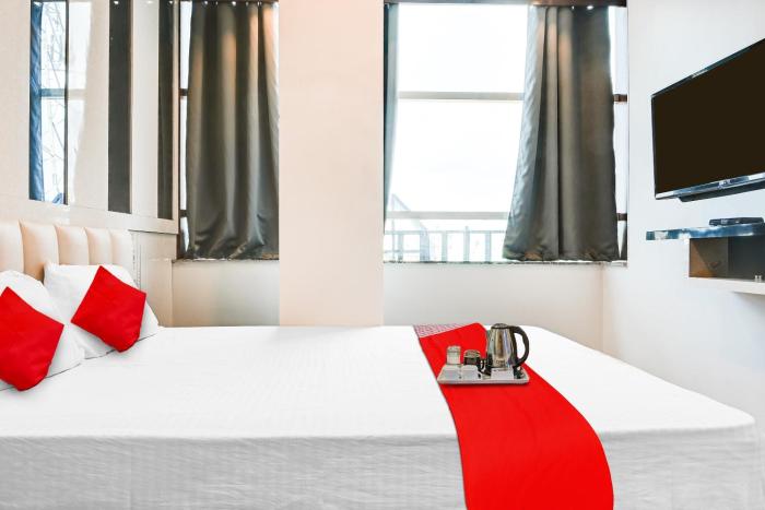 super townhouse zero mile gandhi setu formerly classic court