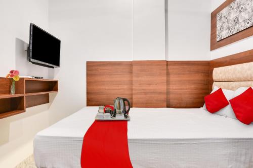 super townhouse zero mile gandhi setu formerly classic court