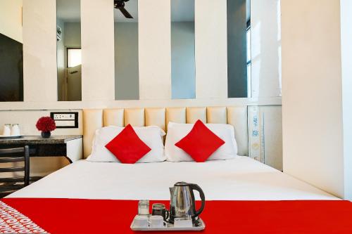 super townhouse zero mile gandhi setu formerly classic court