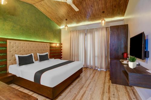 capital o 702282 coco farm resort