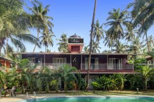 capital o 702282 coco farm resort