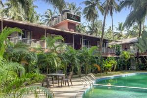 capital o 702282 coco farm resort
