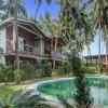 capital o 702282 coco farm resort