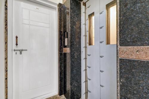 spot on sapthagiri residency