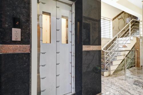 spot on sapthagiri residency