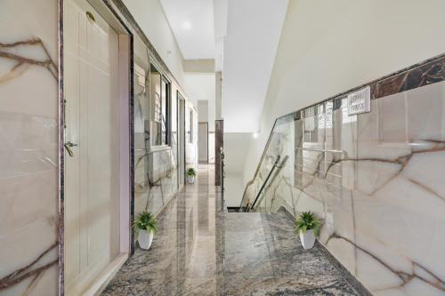 spot on sapthagiri residency