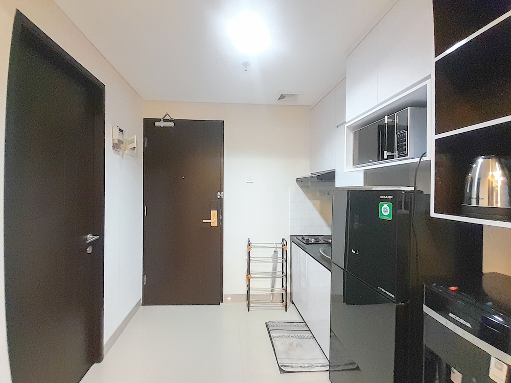 spacious and elegant 1br at patraland amarta apartment