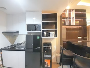 spacious and elegant 1br at patraland amarta apartment